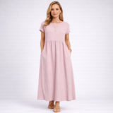 Elvina – Rochie maxi minimalistă crem cu buzunare