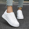 Calindra – Women’s White Lace Up Sneakers